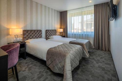 Foto de una habitación de Amberton Hotel Klaipeda