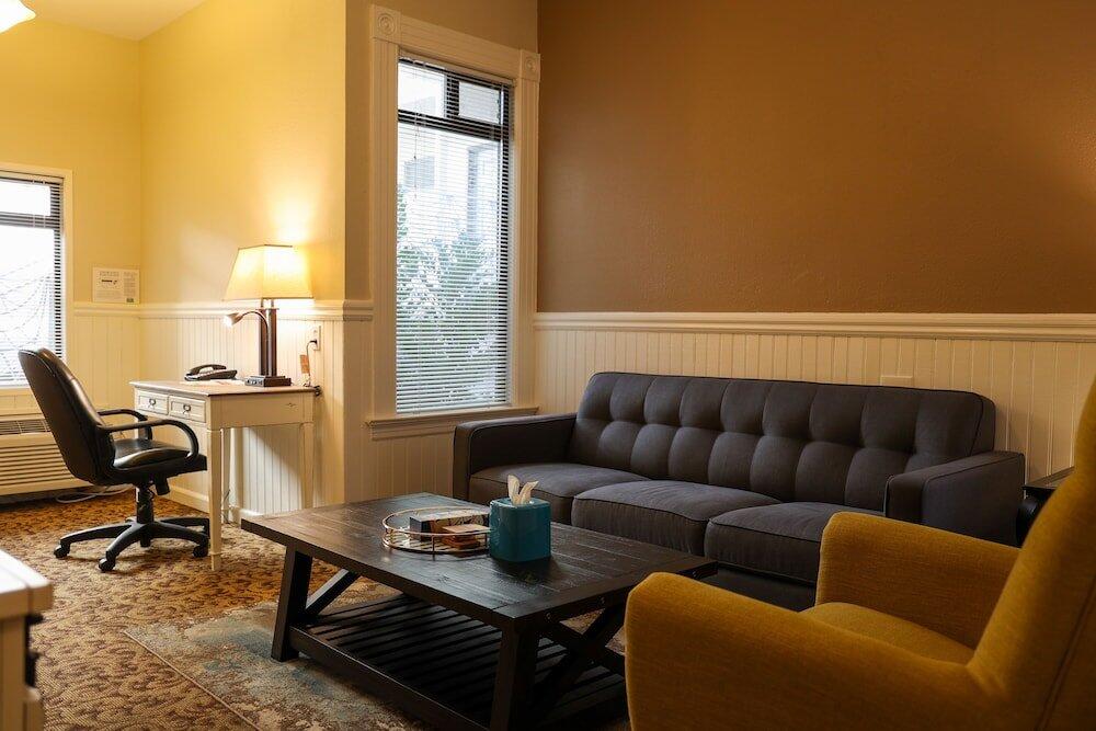 Foto de una habitación de Hotel City Center Inn &amp;amp; Suites
