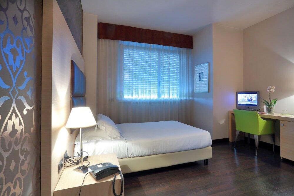 Foto de una habitación de Hotel La Torretta