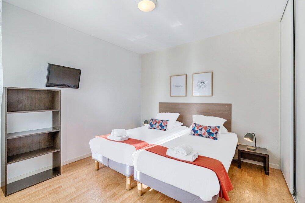 Foto de una habitación de Appart&amp;#039;City Classic Thonon les bains