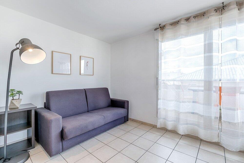 Foto de una habitación de Appart&amp;#039;City Classic Thonon les bains