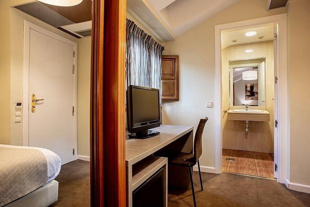 Foto de una habitación de Hotel Ikonik Plaza Mercado