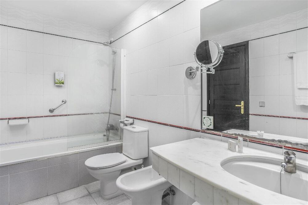 Foto del baño de Aparthotel Club Cala Blanca