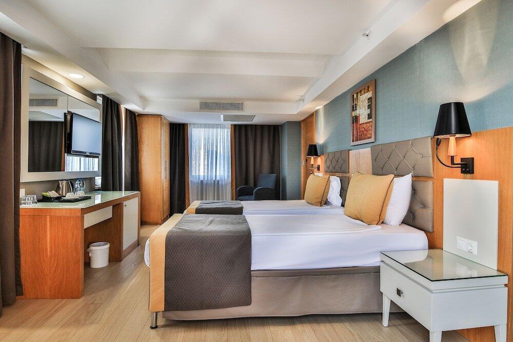 Foto de una habitación de Hotel Saturn Palace Resort