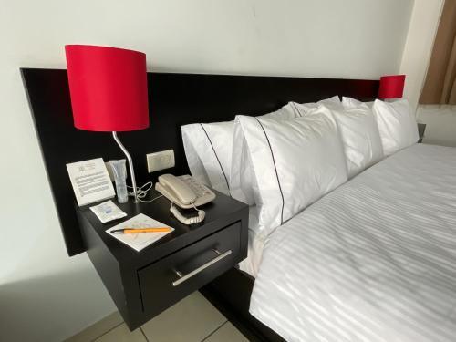 Foto de una habitación de Suites del Real