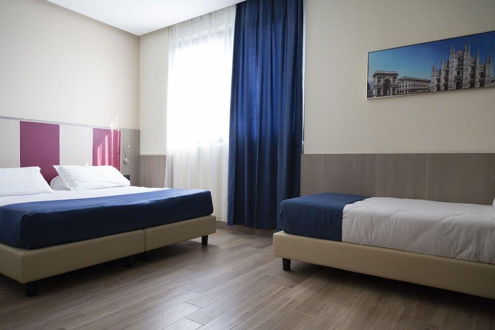 Foto de una habitación de iH Hotels Milano St. John