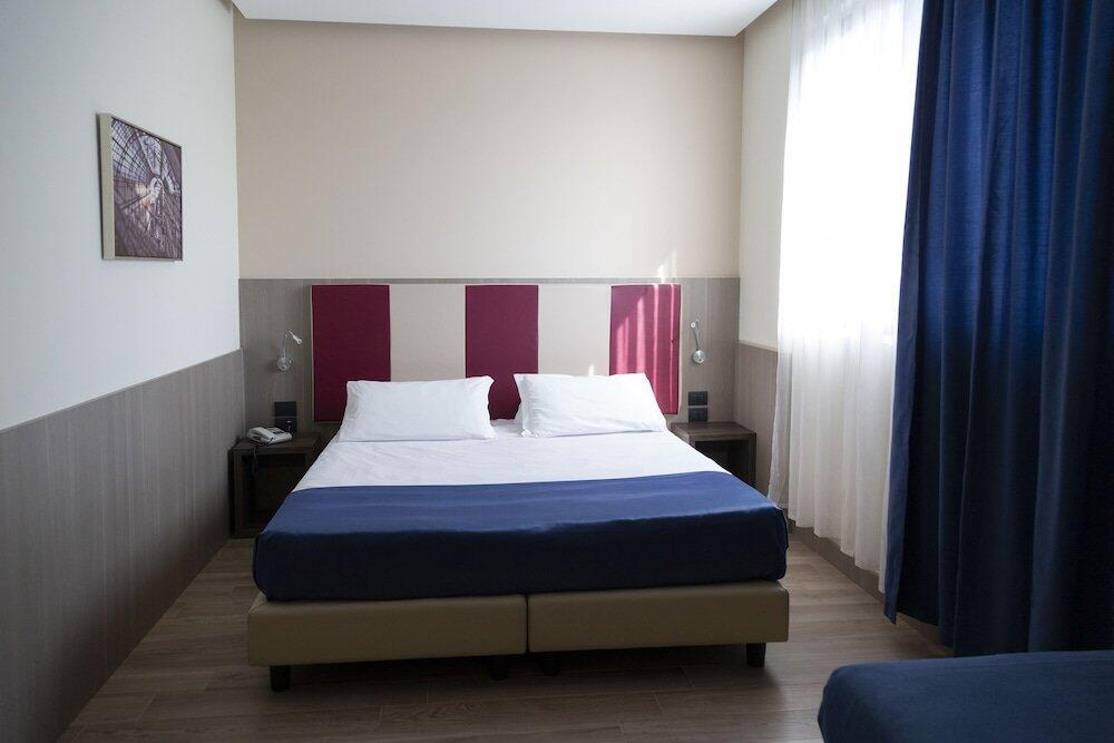 Foto de una habitación de iH Hotels Milano St. John
