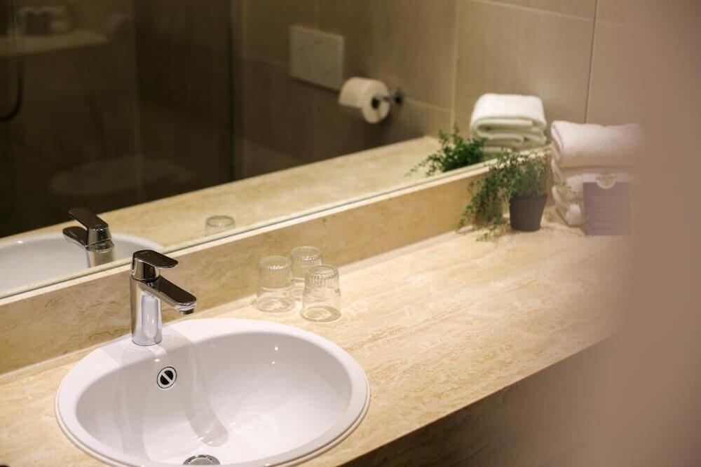 Foto del baño de Hotel Heemskerk