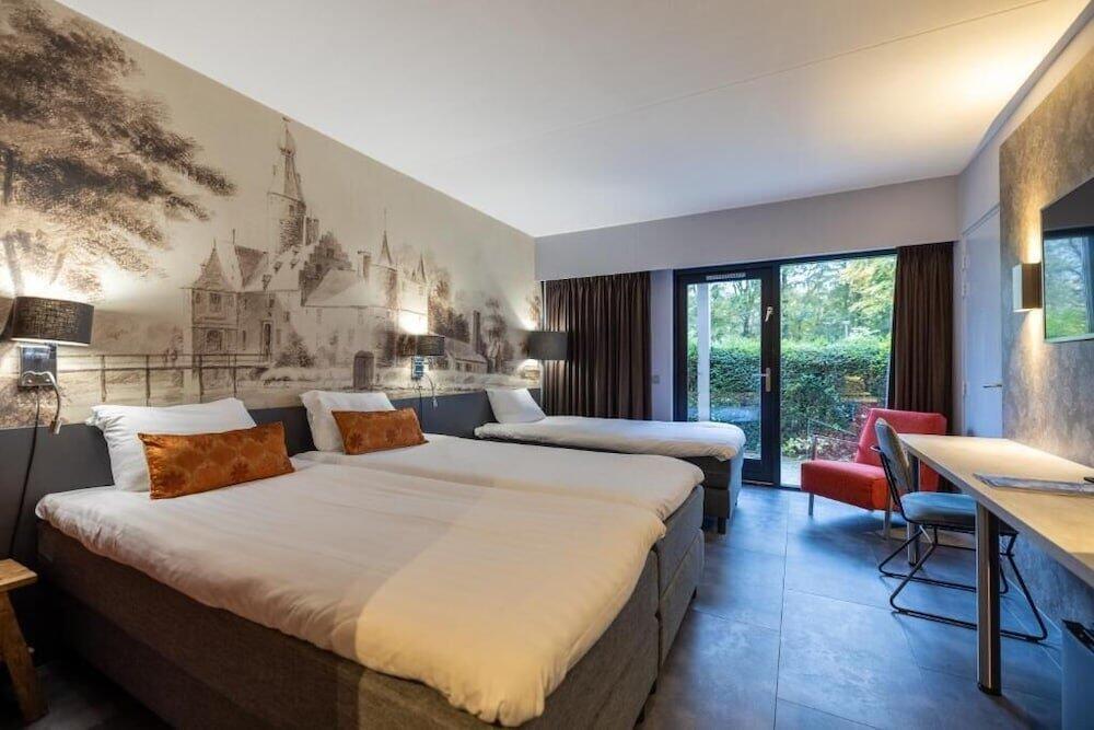Foto de una habitación de Hotel Heemskerk