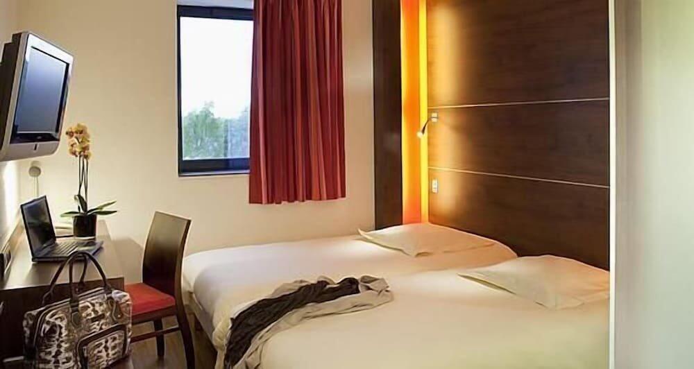 Foto de una habitación de Hotel Oceania Rennes