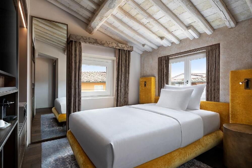 Foto de una habitación de Hotel Grand Universe Lucca, Autograph Collection