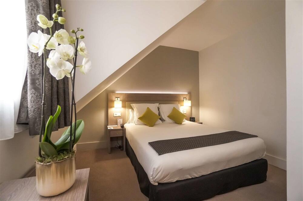 Foto de una habitación de Best Western Plus Hotel Du Parc Chantilly