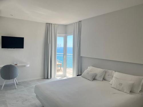Foto de una habitación de Hotel Aromar