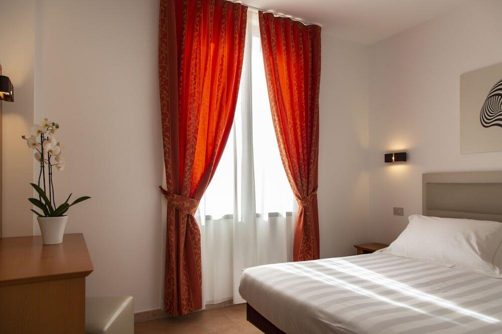 Foto de una habitación de Hotel Villa Paradiso