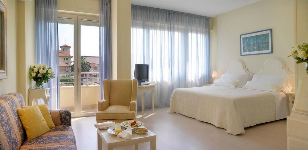 Foto de una habitación de Hotel Sina Astor