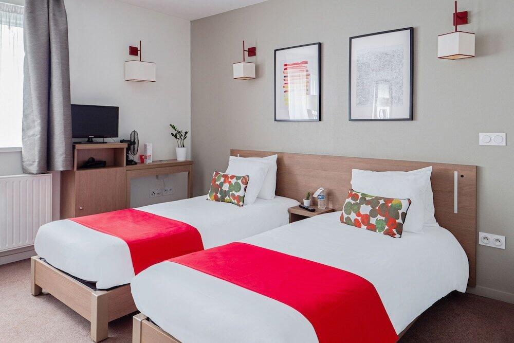 Foto de una habitación de Appart&amp;#039;City Confort Orléans