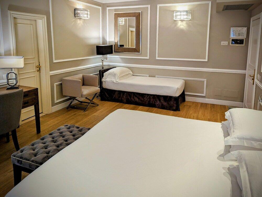 Foto de una habitación de FH55 Hotel Calzaiuoli