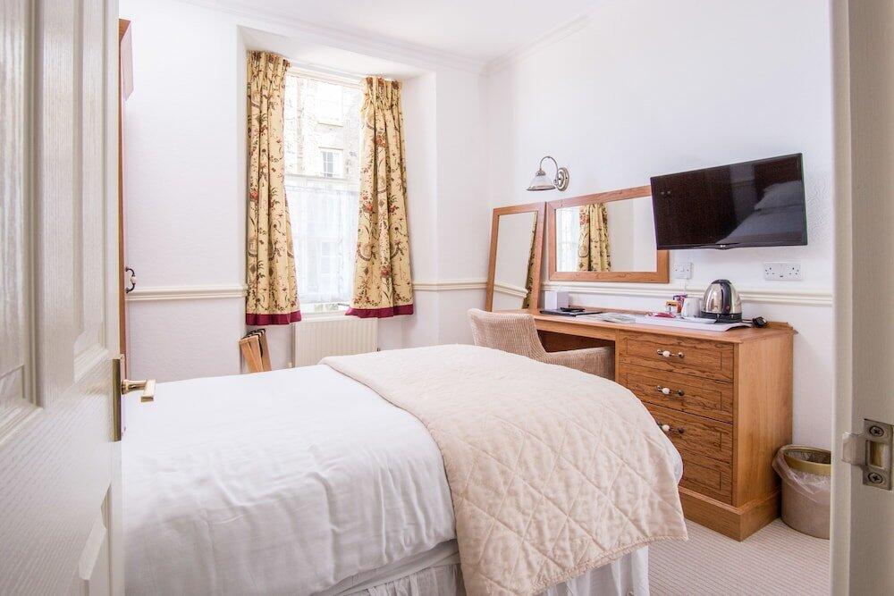 Foto de una habitación de The Queens Hotel