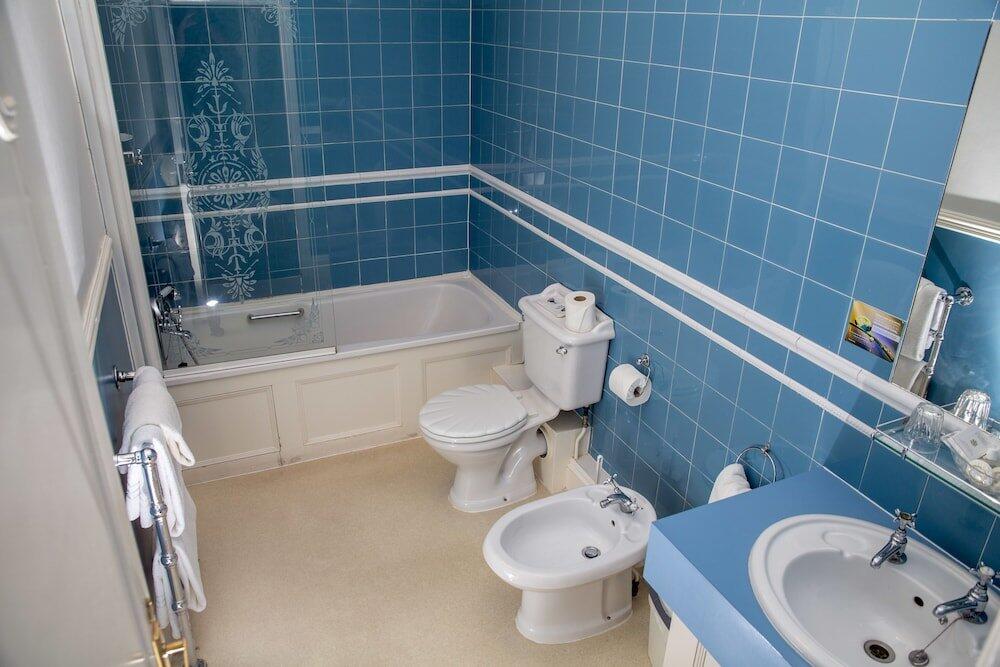 Foto del baño de The Queens Hotel