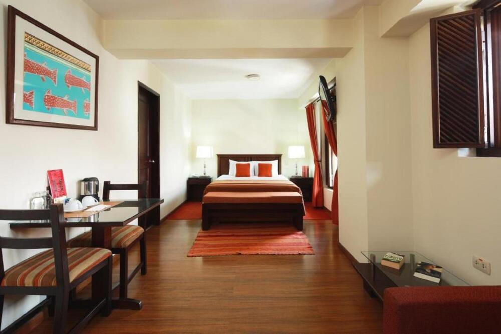 Foto de una habitación de Hotel San Agustin El Dorado