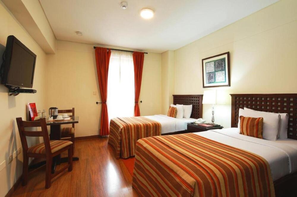 Foto de una habitación de Hotel San Agustin El Dorado