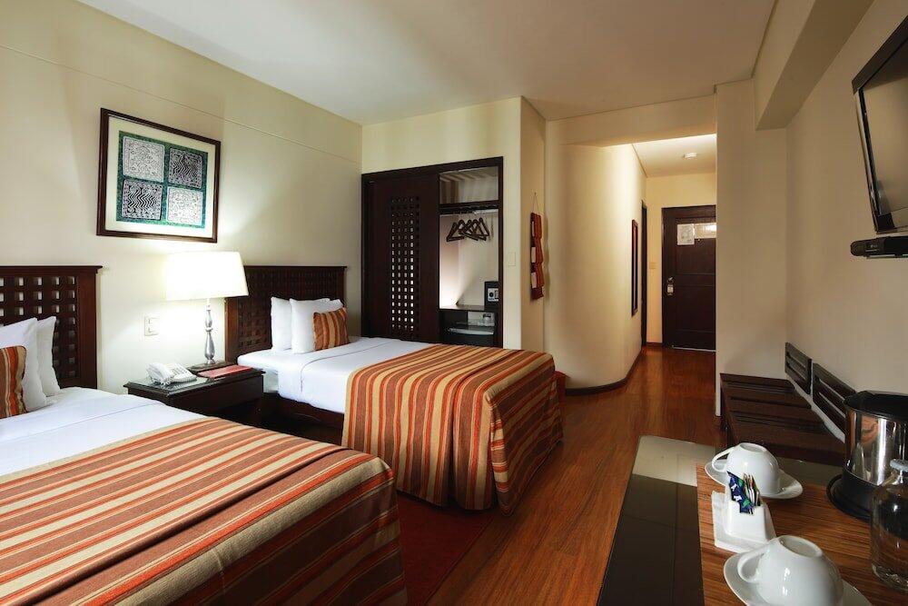Foto de una habitación de Hotel San Agustin El Dorado