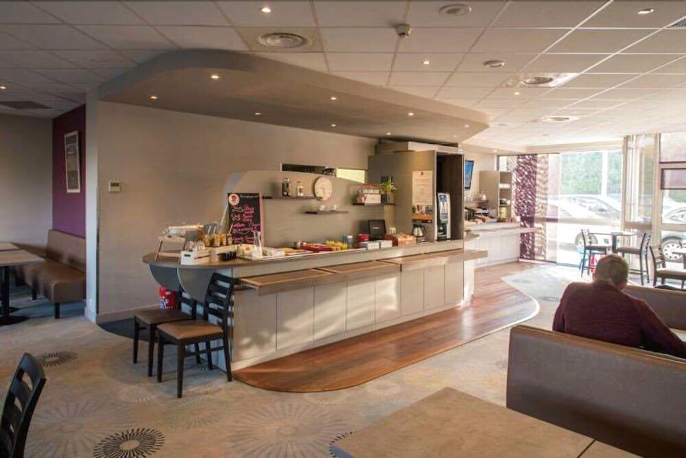 Foto de restauración de Brit Hotel Tours Sud – Le Cheops