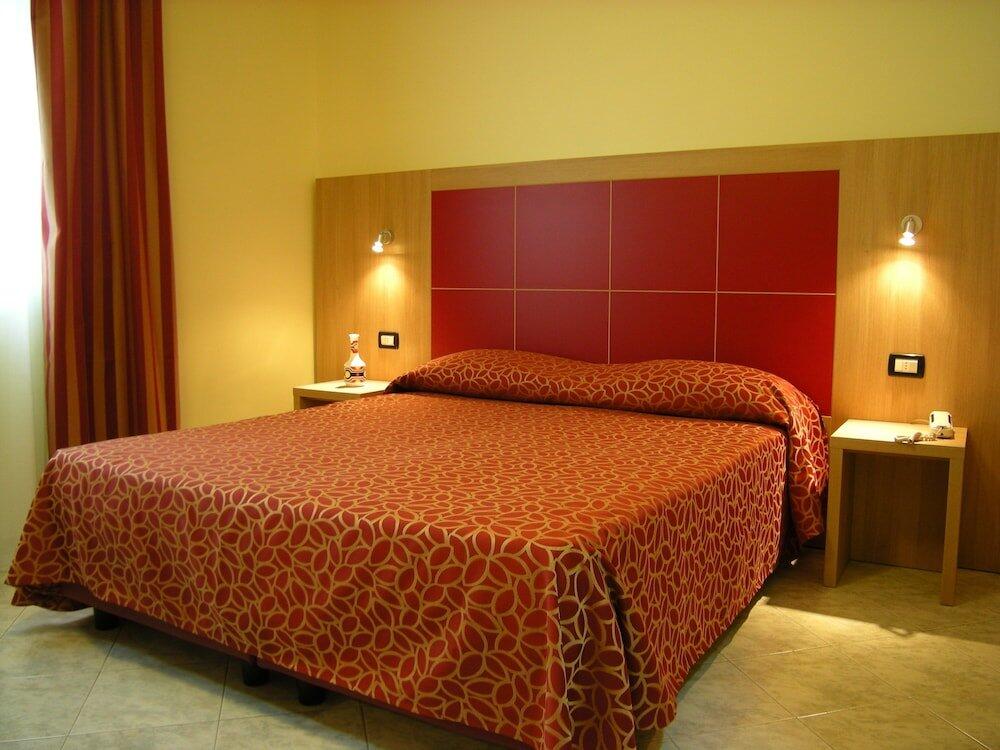 Foto de una habitación de Hotel San Carlo