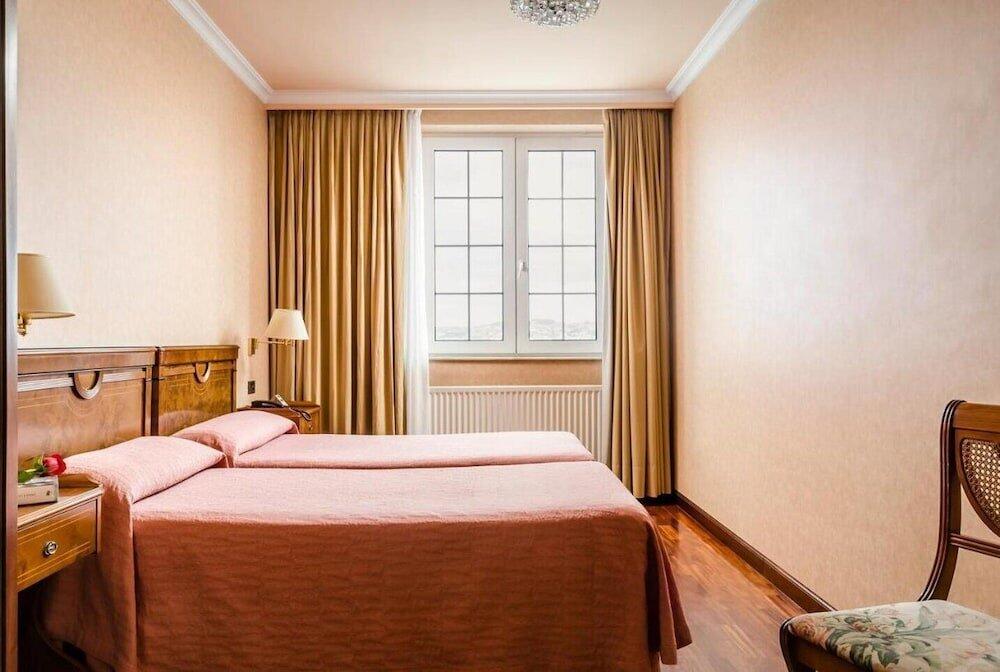 Foto de una habitación de Hotel Alcomar