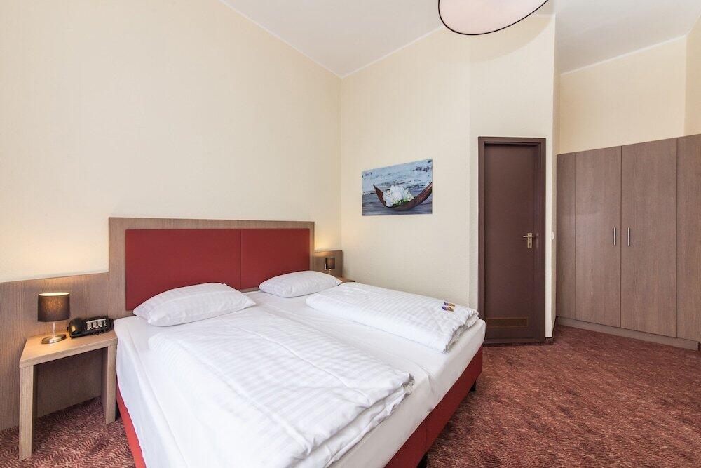 Foto de una habitación de Novum Hotel Maxim Düsseldorf City
