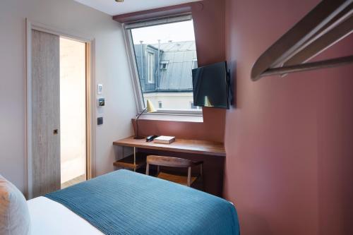 Foto de una habitación de Hotel Maxim Quartier Latin