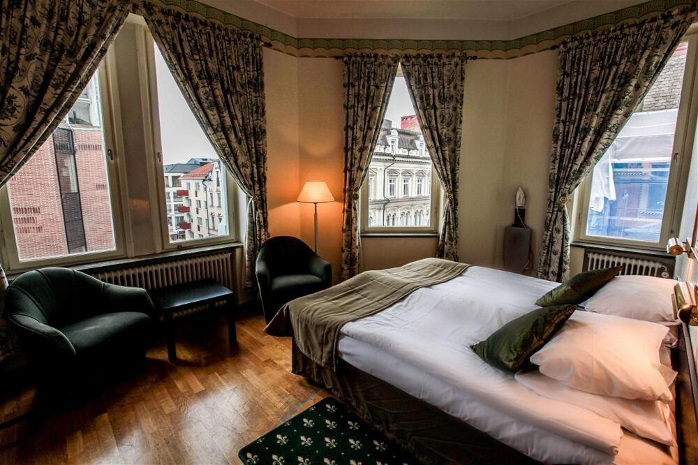 Foto de una habitación de First Hotel Statt