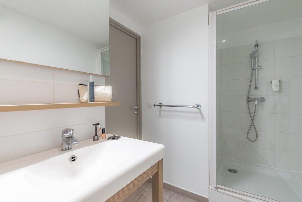 Foto del baño de Appart&amp;#039;City Valence Centre
