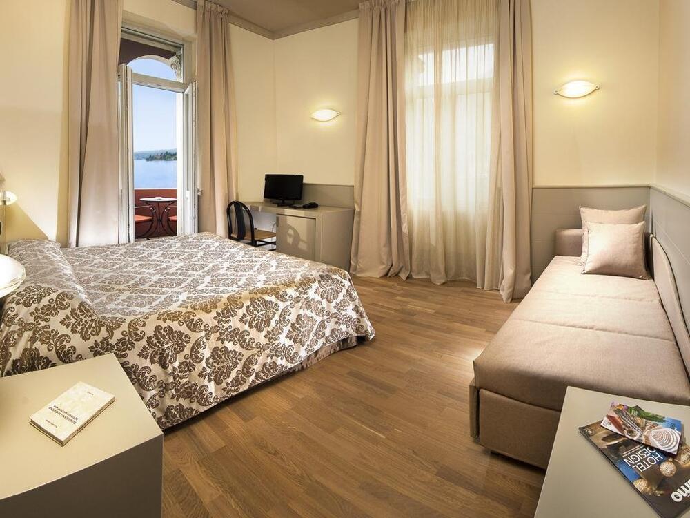 Foto de una habitación de Hotel Milano
