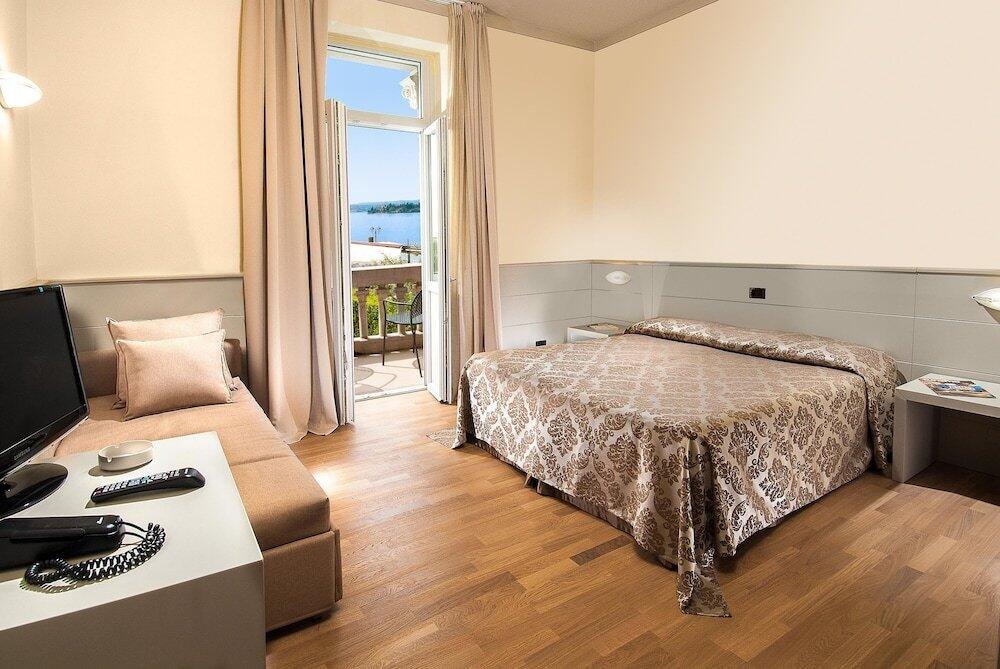 Foto de una habitación de Hotel Milano