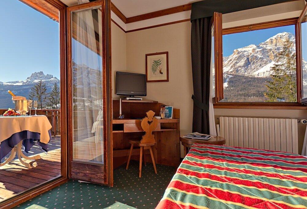 Foto de una habitación de Boutique Hotel Villa Blu Cortina D&amp;#039;Ampezzo