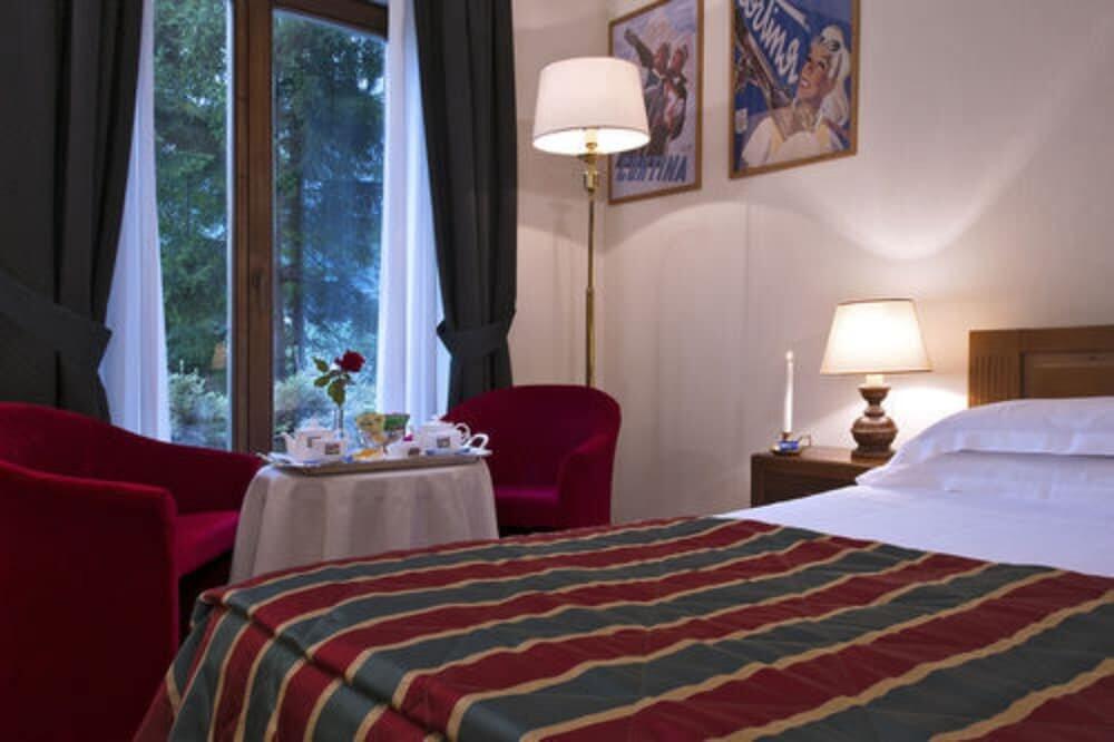 Foto de una habitación de Boutique Hotel Villa Blu Cortina D&amp;#039;Ampezzo