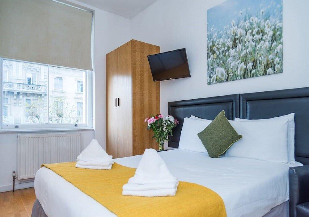 Foto de una habitación de Hyde Park Executive Apartments
