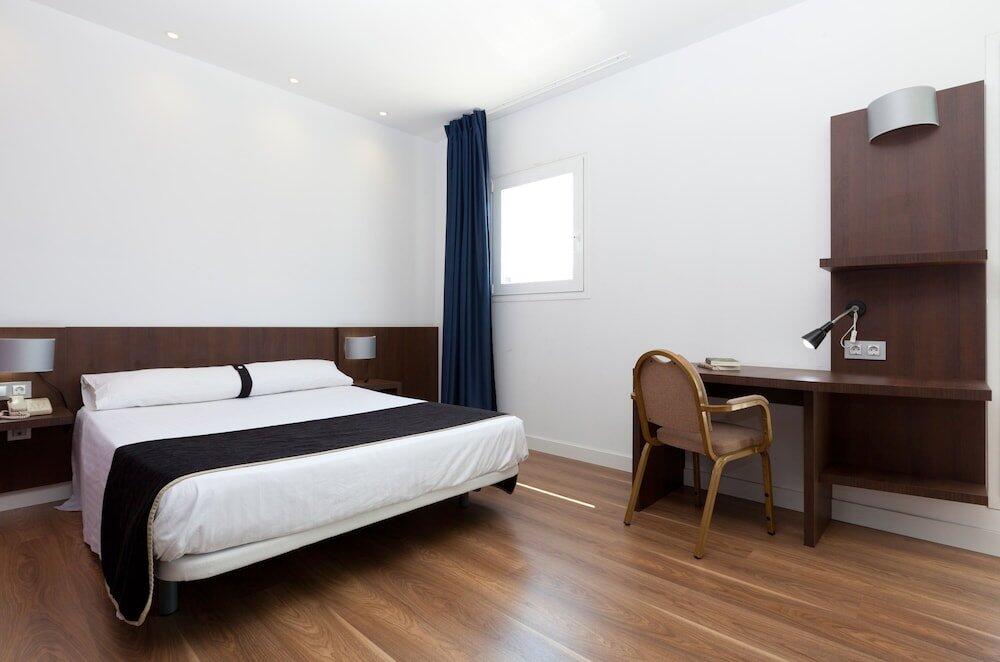 Foto de una habitación de Hotel Olympia Universidades