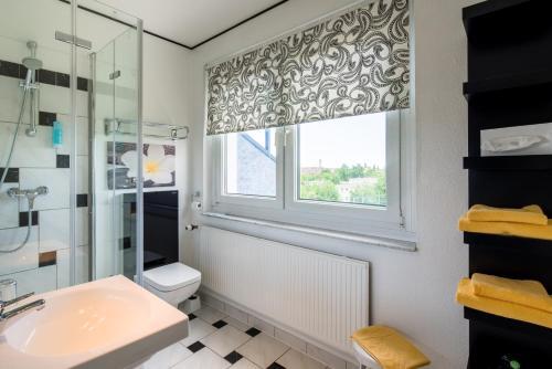 Foto del baño de Best Western Hotel Windorf