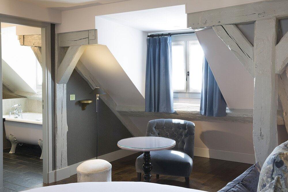 Foto de una habitación de Les Plumes Hotel