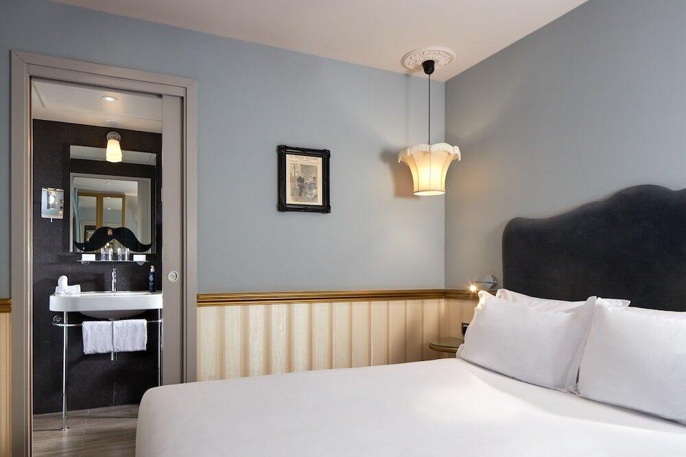 Foto del baño de Les Plumes Hotel