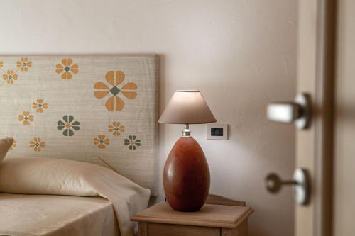 Foto de una habitación de Aparthotel Punta Falcone Resort