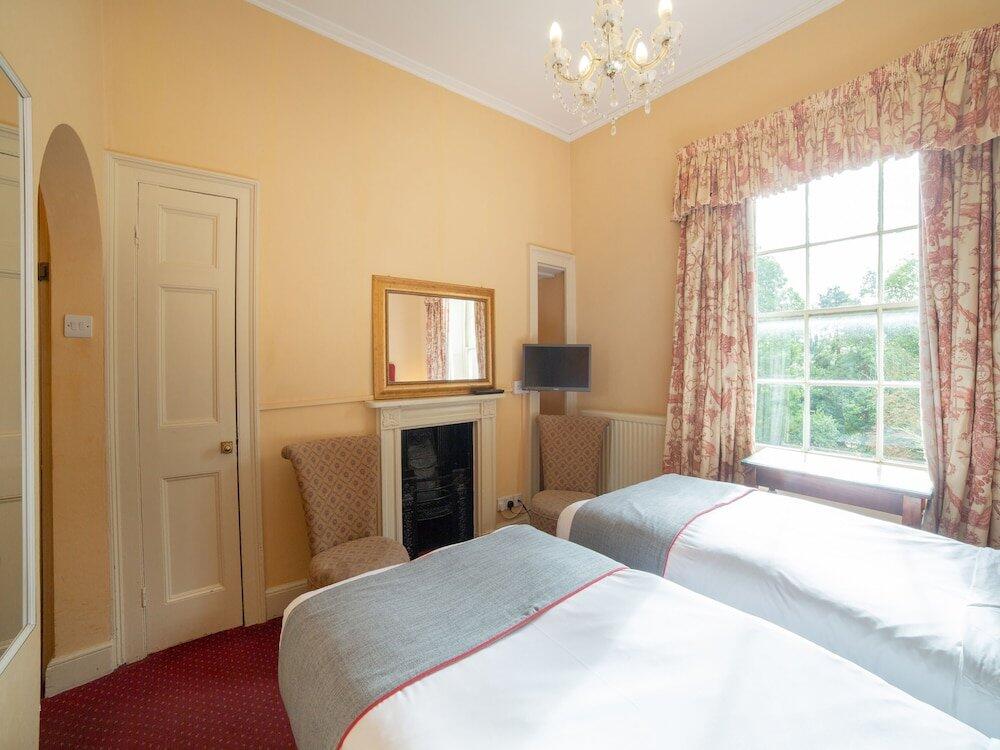 Foto de una habitación de Hotel OYO Bailbrook Lodge