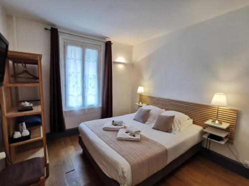 Foto de una habitación de Hôtel des Falaises
