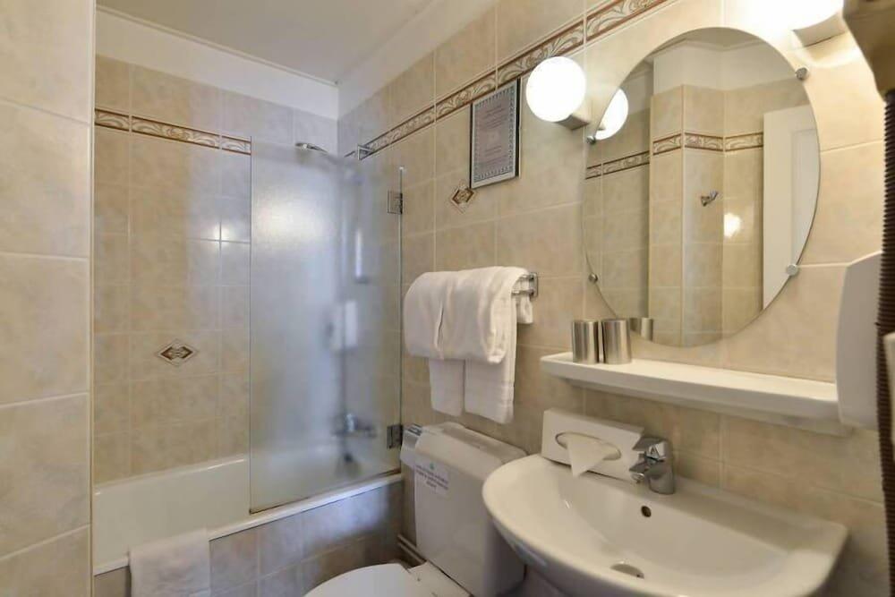 Foto del baño de Hôtel De France
