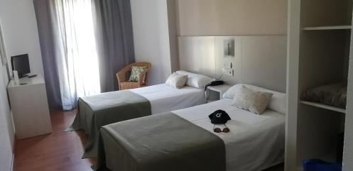 Foto de una habitación de Duerming Villa De Sarria Hotel