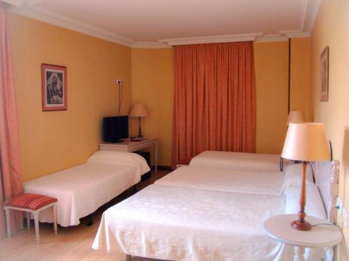 Foto de una habitación de Hotel San Camilo