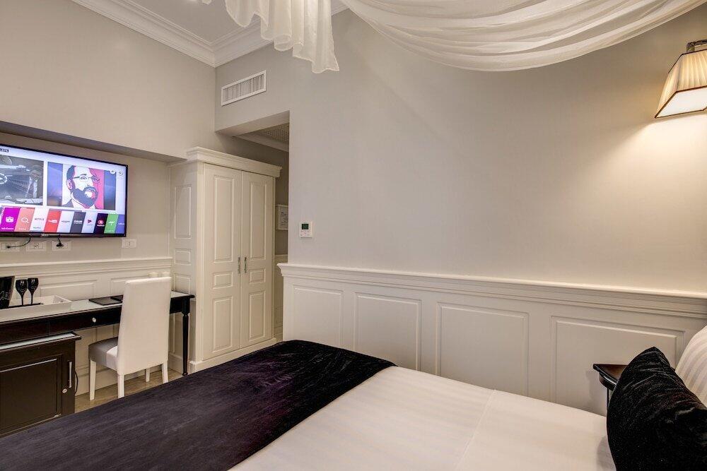 Foto de una habitación de Hotel Tito
