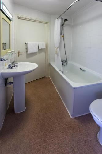 Foto del baño de Heathlands Hotel